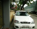 Daewoo Lanos SX 2001 - Cần bán Daewoo Lanos SX năm sản xuất 2001, màu trắng xe gia đình, 58 triệu