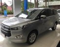 Toyota Innova 2.0E 2016 - Cần bán gấp Toyota Innova 2.0E đời 2016, màu bạc như mới, 695 triệu