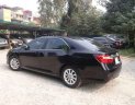 Toyota Camry 2.0 E  2015 - Bán ô tô Toyota Camry 2.0 E năm 2015, màu đen chính chủ, giá tốt