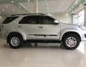 Toyota Fortuner 2014 - Cần bán lại xe Toyota Fortuner năm sản xuất 2014, màu bạc số tự động