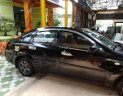 Daewoo Lacetti 2010 - Bán ô tô Daewoo Lacetti năm 2010, màu đen xe gia đình, giá chỉ 202 triệu