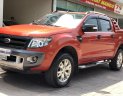 Ford Ranger Wildtrak 2.2AT 2014 - Bán xe Ford Ranger Wildtrak 2.2AT đời 2014 màu cam, giá tốt, nhập khẩu nguyên chiếc