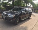 Toyota Hilux E 2011 - Cần bán lại xe Toyota Hilux E đời 2011, màu đen, nhập khẩu nguyên chiếc xe gia đình giá cạnh tranh