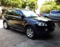 Chevrolet Captiva LT 2.4 MT 2009 - Cần bán gấp Chevrolet Captiva LT 2.4 MT năm 2009, màu đen