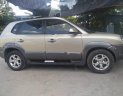 Hyundai Tucson 2009 - Bán Hyundai Tucson sản xuất 2009, màu vàng