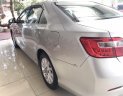 Toyota Camry 2.0E 2013 - Cần bán gấp Toyota Camry 2.0E đời 2013, màu bạc chính chủ, 760 triệu