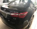 Toyota Corolla altis 1.8 G 2014 - Cần bán lại xe Toyota Corolla Altis 1.8 G 2014, màu đen chính chủ, giá 605tr