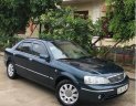 Ford Laser Ghia 1.8 MT 2003 - Cần bán lại xe Ford Laser Ghia 1.8 MT đời 2003, màu xanh lam  