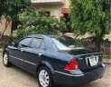 Ford Laser Ghia 1.8 MT 2003 - Cần bán lại xe Ford Laser Ghia 1.8 MT đời 2003, màu xanh lam  