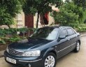 Ford Laser Ghia 1.8 MT 2003 - Cần bán lại xe Ford Laser Ghia 1.8 MT đời 2003, màu xanh lam  