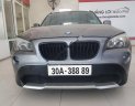 BMW X1 sDrive18i 2010 - Bán xe BMW X1 sDrive18i đời 2010, màu bạc, xe nhập  