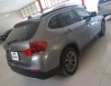 BMW X1 sDrive18i 2010 - Bán xe BMW X1 sDrive18i đời 2010, màu bạc, xe nhập  