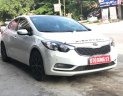 Kia K3 1.6 AT 2014 - Bán xe Kia K3 1.6 AT đời 2014, màu đen số tự động, giá tốt