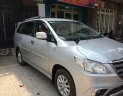 Toyota Innova  E 2014 - Cần bán gấp Toyota Innova E sản xuất 2014, màu bạc ít sử dụng