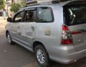 Toyota Innova  E 2014 - Cần bán gấp Toyota Innova E sản xuất 2014, màu bạc ít sử dụng