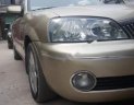 Ford Laser 2002 - Bán Ford Laser 2002, màu vàng