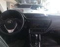 Toyota Corolla altis 2018 - Cần bán lại xe Toyota Corolla altis sản xuất 2018, màu trắng, giá tốt