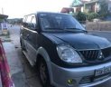 Mitsubishi Jolie 2004 - Cần bán xe Mitsubishi Jolie đời 2004, màu xanh lam số sàn 