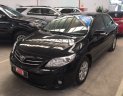 Toyota Corolla altis 2012 - Cần bán lại xe Toyota Corolla altis đời 2012, màu đen số sàn, 530tr