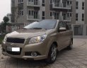 Chevrolet Aveo LT 1.5 MT 2014 - Cần bán gấp Chevrolet Aveo 1.5MT sản xuất 2014, màu vàng xe gia đình