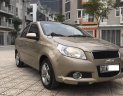 Chevrolet Aveo LT 1.5 MT 2014 - Cần bán gấp Chevrolet Aveo 1.5MT sản xuất 2014, màu vàng xe gia đình