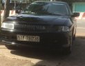 Mitsubishi Lancer 2002 - Cần bán xe Mitsubishi Lancer sản xuất 2002, màu đen