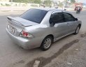 Mitsubishi Lancer    2004 - Cần bán lại xe Mitsubishi Lancer đời 2004, màu bạc