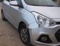 Hyundai i10 1.0 MT 2014 - Bán Hyundai i10 1.0 MT đời 2014, màu bạc số sàn