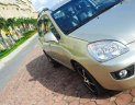 Kia Carens 2.0 2009 - Cần bán Kia Carens 2.0 sx 2009, màu vàng