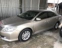 Toyota Camry  E 2.0AT 2014 - Bán xe Toyota Camry sản xuất 2014 màu vàng, 788 triệu