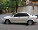 Ford Laser 1.8AT 2004 - Bán Ford Laser 1.8AT đời 2004, màu trắng chính chủ, 235 triệu