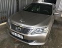 Toyota Camry 2.0E 2014 - Bán Toyota Camry 2.0E màu vàng cát số tự động sản xuất T12/2014 biển Bình Dương lăn bánh đúng 39000km