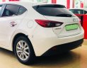 Mazda 3 1.5AT 2015 - Bán ô tô Mazda 3 1.5AT 2015, màu trắng xe gia đình, giá tốt