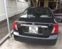 Daewoo Lacetti    2010 - Cần bán Daewoo Lacetti đời 2010, màu đen