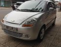 Chevrolet Spark 2015 - Cần bán gấp Chevrolet Spark sản xuất 2015, màu bạc