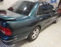 Proton Wira   1998 - Cần bán lại xe Proton Wira đời 1998, màu xanh lục, nhập khẩu nguyên chiếc như mới, 125 triệu