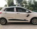 Hyundai Grand i10 2015 - Cần bán xe Hyundai Grand i10 sản xuất 2015, màu trắng, nhập khẩu nguyên chiếc chính chủ