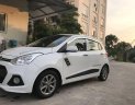 Hyundai Grand i10 2015 - Cần bán xe Hyundai Grand i10 sản xuất 2015, màu trắng, nhập khẩu nguyên chiếc chính chủ