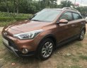 Hyundai i20 Active 1.4 AT 2WD 2016 - Cần bán Hyundai i20 Active nhập khẩu 2016, màu nâu đi mới 18.000km