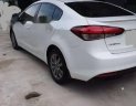 Kia Cerato 2016 - Cần bán gấp Kia Cerato năm 2016, màu trắng số sàn, 495 triệu