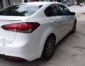 Kia Cerato 2016 - Cần bán gấp Kia Cerato năm 2016, màu trắng số sàn, 495 triệu