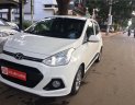 Hyundai Grand i10 2014 - Cần bán xe Hyundai Grand i10 năm sản xuất 2014, màu trắng, nhập khẩu nguyên chiếc