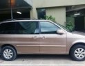 Kia Carnival   2.5 AT  2008 - Bán Kia Carnival 2.5 AT đời 2008, màu nâu