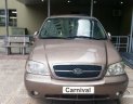 Kia Carnival   2.5 AT  2008 - Bán Kia Carnival 2.5 AT đời 2008, màu nâu