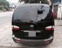 Hyundai Starex   2006 - Bán xe Hyundai Starex đời 2006, màu đen 