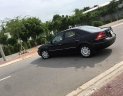 Ford Mondeo   2005 - Cần bán Ford Mondeo sản xuất 2005, màu đen, xe nhập