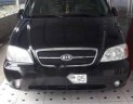 Kia Carnival 2009 - Bán ô tô Kia Carnival đời 2009, màu đen, giá 259tr