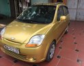 Chevrolet Spark LT 2009 - Bán Chevrolet Spark LT năm 2009, màu vàng