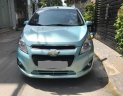 Chevrolet Spark LTZ 2015 - Bán gấp Chevrolet Spark LTZ 2015 xanh ngọc tự động