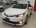 Toyota Corolla altis 1.8E CVT 2018 - Bán ô tô Toyota Corolla Altis 1.8E CVT sản xuất 2018, màu trắng, giá 707tr